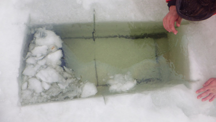 Figure 9 When ice thickness was larger than the blade length (36 inches), holes had to be cut in two steps